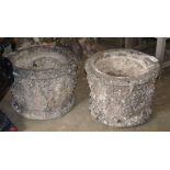 A pair of circular stone vineous planters, diameter 46cm, H.36cm