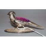An Edwardian novelty silver mounted pin cushion, modelled as a pheasant by S. Mordan & Co,