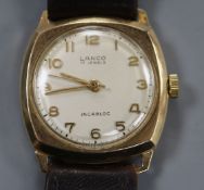 A gentleman's 1960's 9ct gold Lanco manual wind wrist watch, on leather strap.CONDITION: Case
