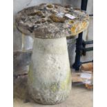 A 19th century natural stone staddle stone, Diameter 48cm, H.64cmCONDITION: The top partially moss