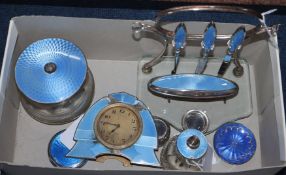 A collection of silver and blue enamel dressing table items, including a part manicure set