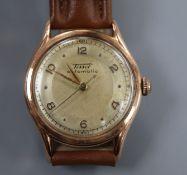 A gentleman's 14k Tissot automatic wrist watch, movement c.28.5.21, on later associated leather