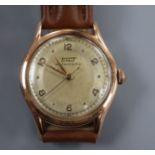 A gentleman's 14k Tissot automatic wrist watch, movement c.28.5.21, on later associated leather