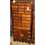 A pair of Chinese hardwood medicine chests, W.55cm, D.39cm., H.124cm