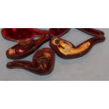 Three Meerschaum pipes