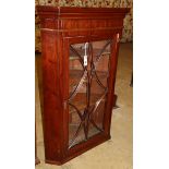 A George III glazed mahogany hanging corner cupboard, W.74cm, D.44cm, H.116cm