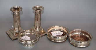 A pair of modern silver wine coasters, 10.2cm, a pair of Victorian Doric column dwarf