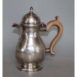 A George V silver hot water pot, maker's mark rubbed, Birmingham, 1921, 19cm, gross 14.5 oz.