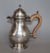 A George V silver hot water pot, maker's mark rubbed, Birmingham, 1921, 19cm, gross 14.5 oz.