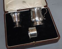 A George V silver part christening set, goblet and mug, Birmingham, 1928 and associated silver