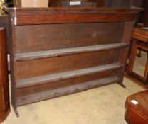 An 18th century oak plate rack, W.186cm, D.23cm, H.123cm