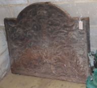 A 'Charles II' cast iron fire back, W.87cm, H.72cm