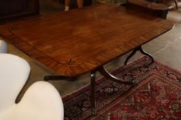 A Regency ebony inlaid mahogany tilt top dining table, W.156cm, D.100cm, H.72cmCONDITION: