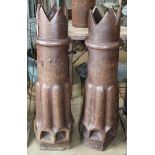 A pair of Victorian Champion earthenware chimney pots, H.114cm