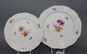 A set of eight Berlin plates, decorated with butterflies and flowers, diameter 21cm (5) and 24cm (