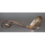 A 1920's Georg Jensen sterling silver 'leaf and berry' ladle, design no. 141, 18.8cm, 80 grams.