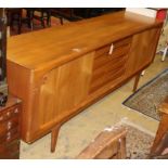 A Danish mid century teak sideboard, W.210cm, D.50cm, H.80cmCONDITION: No visible