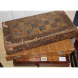 Three chess / backgammon boards and a few pieces