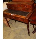 A mid 19th century French mahogany desk, with pull-out leather inset writing surface, W.98cm, D.