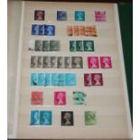 A collection of world stamps in various albums and stock books