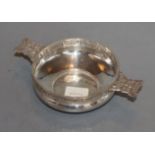 A George V Arts & Crafts pierced and planished silver two handled bowl (lacking liner?), by Albert