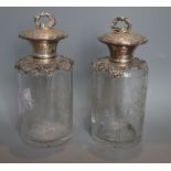 A pair of early 20th century Portuguese white metal mounted etched glass scent jars, only one with