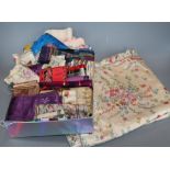 A printed 19th century coverlet and a collection of printed silk ribboning