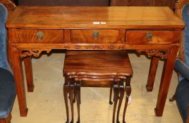 A Chinese hardwood three drawer side table, W.116cm, D.36cm, H.82cm