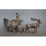 A late 19th century German silver bonbon dish, modelled as a reindeer pulling a sleigh with