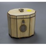 A George III decagonal ivory and tortoiseshell veneered tea caddy, height 10cm