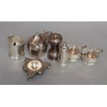 A Gorge V silver three piece condiment set, a George III silver mustard(lid a.f.), a silver pepper