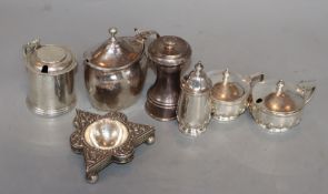 A Gorge V silver three piece condiment set, a George III silver mustard(lid a.f.), a silver pepper