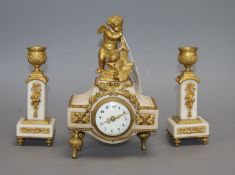 A 19th century ormolu clock garniture, with angelic surmount