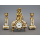 A 19th century ormolu clock garniture, with angelic surmount