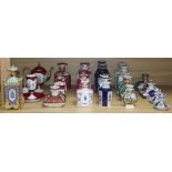 A collection of French porcelain scent bottles and a teapot (24)