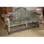 A Lutyens style weathered teak garden bench, W.200cm, D.50cm, H.106cmCONDITION: The majority of