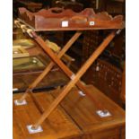 A Victorian mahogany galleried butler's tray, on folding stand, tray W.64cm, D.50cm, H.78cm