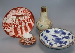 An 18th century Japanese blue and white dish, a studio vase and a Kutani plate and tea bowl and