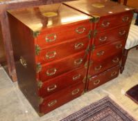 A pair of military-style small five drawer chests, W.50cm, D.46cm, H.81cmCONDITION: Good original