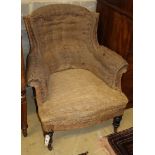A Napoleon III ebonised armchair