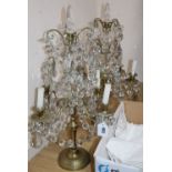 A pair of late 19th century Bohemian brass and lustre hung four branch candelabra, height 60cm (