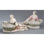 A pair of John Bevington figural centrepieces with baskets, height 19cmCONDITION: Female - right arm