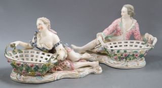 A pair of John Bevington figural centrepieces with baskets, height 19cmCONDITION: Female - right arm