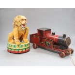 A 1950's-60's Rock Vally Toy battery operated circus lion together with a pull along wooden