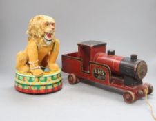 A 1950's-60's Rock Vally Toy battery operated circus lion together with a pull along wooden