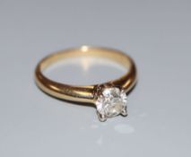 A modern 18ct gold and solitaire diamond ring, size Q, gross 4.5 grams.CONDITION: Minor scratches to