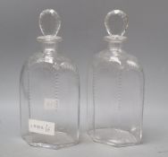 A pair of James Powell Whitefriars hexagonal half-cut glass decanters and stoppers, height