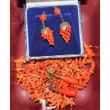 Two pairs of gilt coral mounted coral earrings including bunches of grapes and a coral necklace.