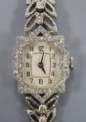 A lady's 18ct white gold and diamond set cocktail watch with diamond set bracelet, length 16cm,