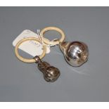 Two German 800 white metal babys rattles, with bone teethers, largest 44mm, gross 34 grams.